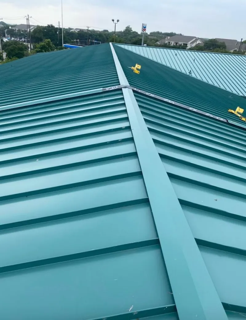 Green commercial metal roof ridge and valley for Metal Roof Repair in Grand Rapids